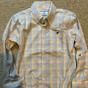 Properly tied boys button up shirt